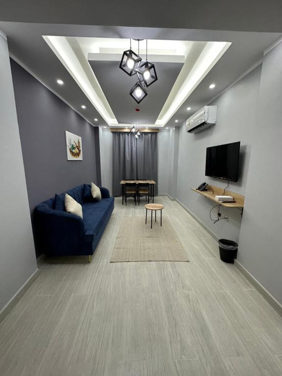 TV a/nebo společenská místnost v ubytování Blue Rose Hotel
