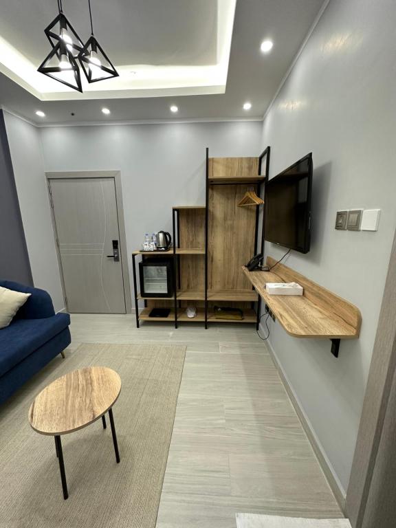 TV a/nebo společenská místnost v ubytování Blue Rose Hotel