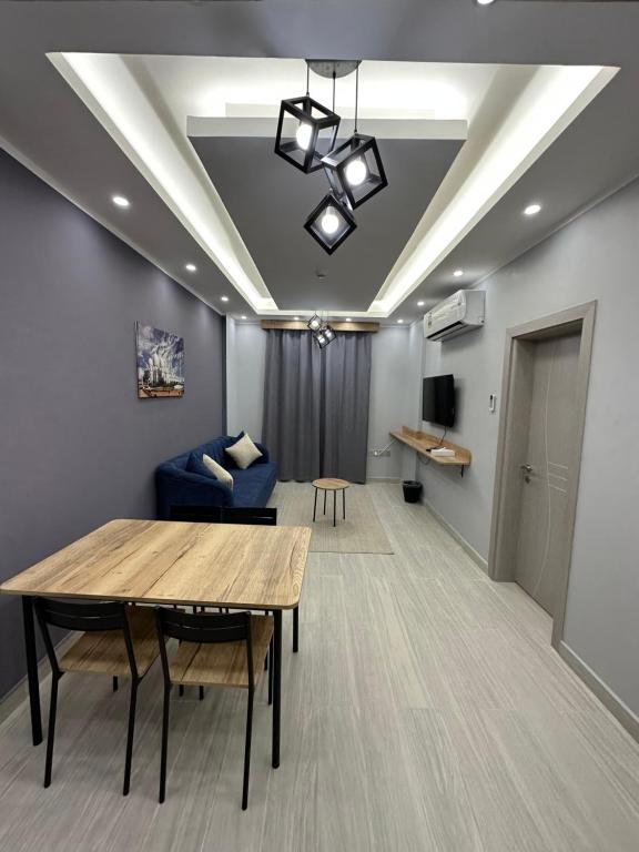 TV a/nebo společenská místnost v ubytování Blue Rose Hotel