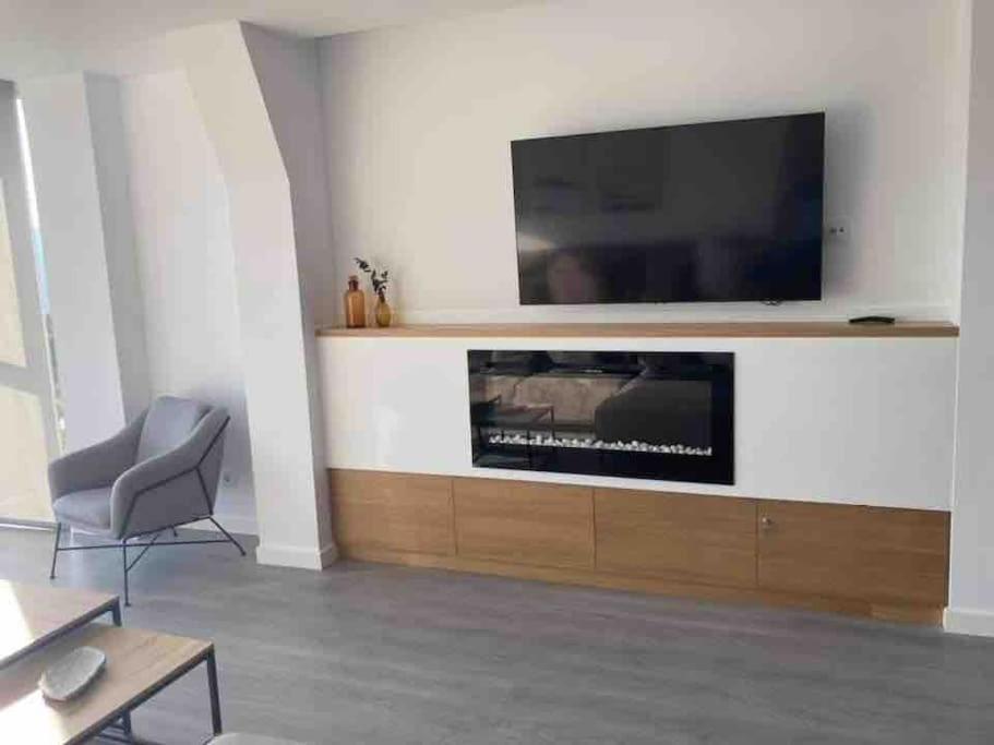 TV a/nebo společenská místnost v ubytování Casa dos Alén