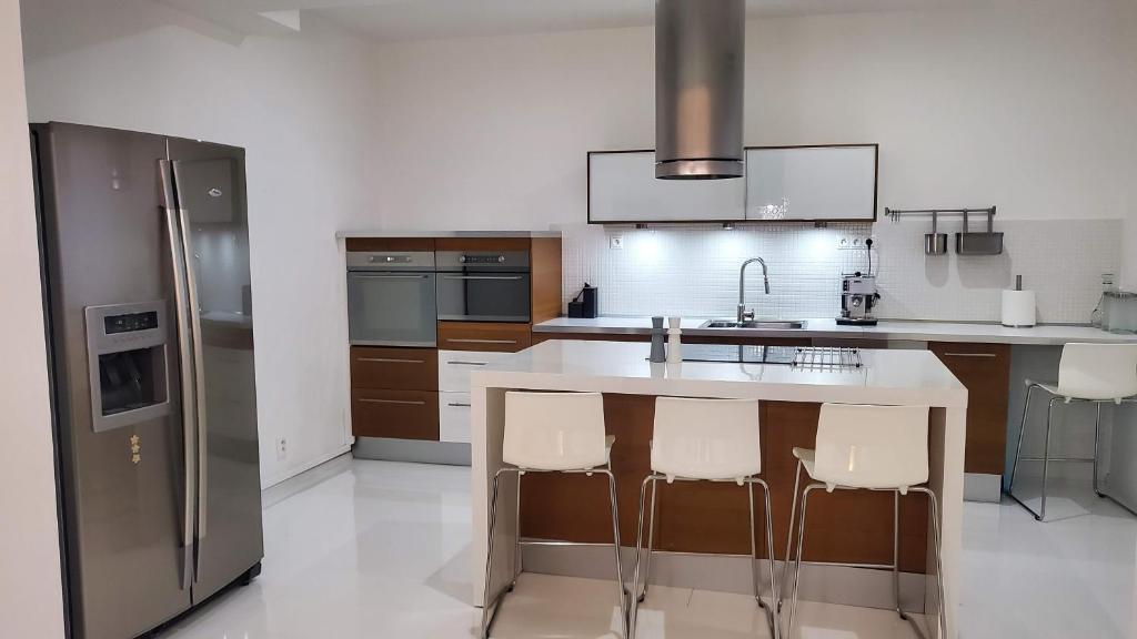 Kuchyň nebo kuchyňský kout v ubytování Apartmán Julie