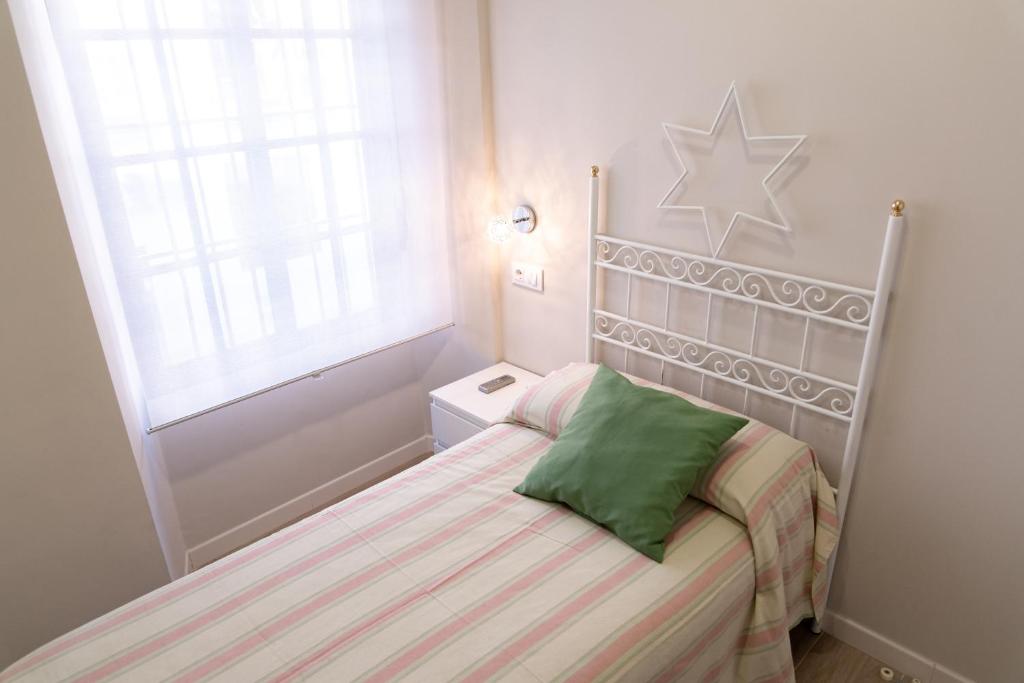 Postel nebo postele na pokoji v ubytování FAMORCAS Centro A y B