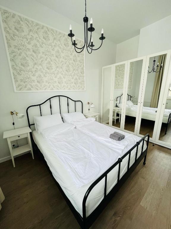 Posteľ alebo postele v izbe v ubytovaní Pistacjowy - Apartamenty Smart Projekt