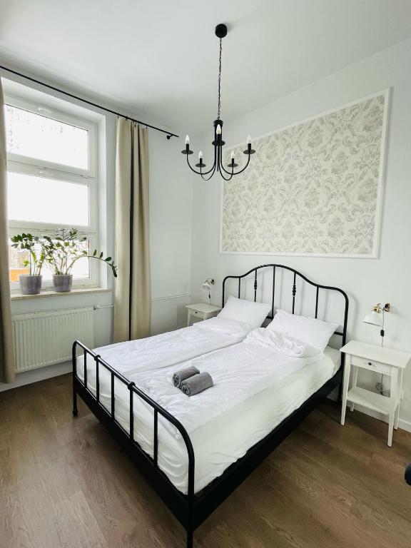 Posteľ alebo postele v izbe v ubytovaní Pistacjowy - Apartamenty Smart Projekt