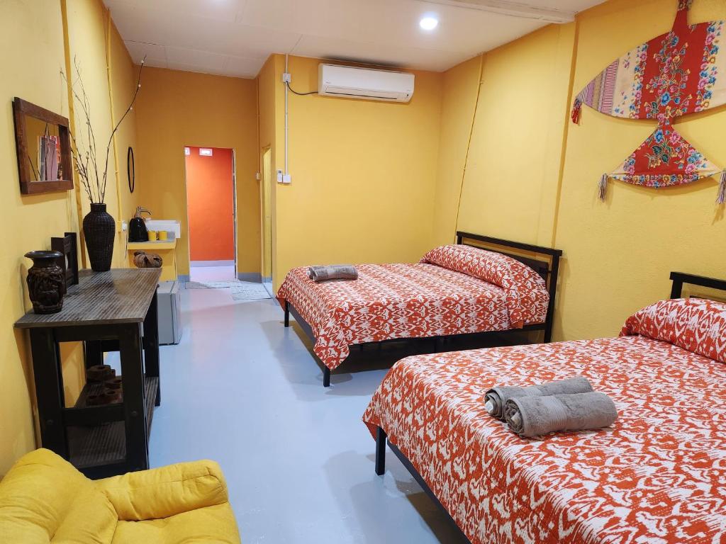 Voodi või voodid majutusasutuse Gecko Guesthouse toas