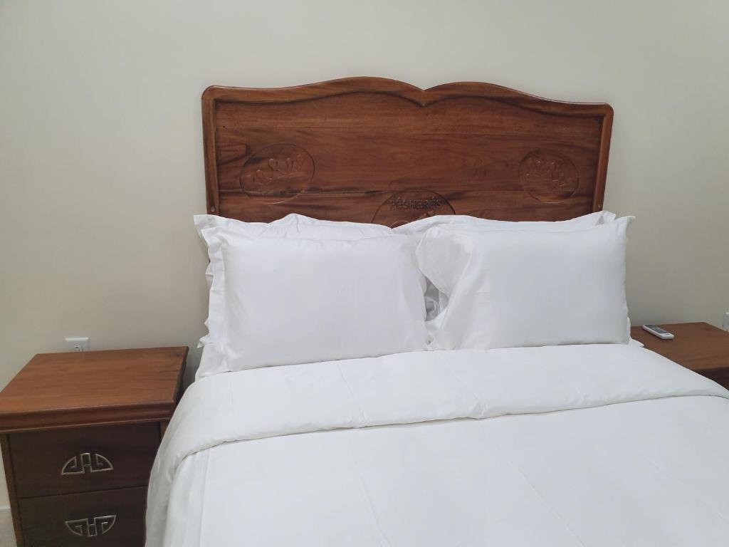 Postel nebo postele na pokoji v ubytování PESHERES INN & SPA