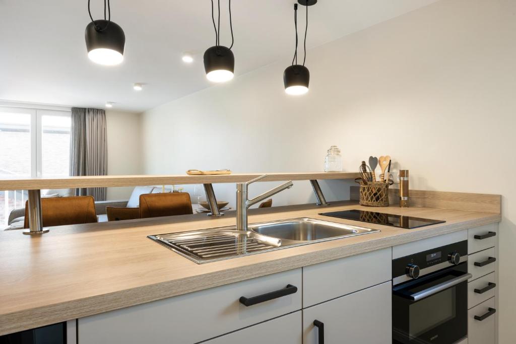 Kuchyň nebo kuchyňský kout v ubytování My Suite Leesch - Hotel & Restaurant nahe Büsum - Hunde herzlich willkommen