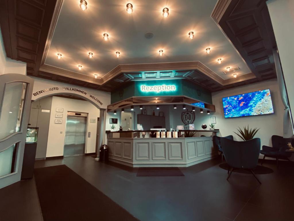 TV a/nebo společenská místnost v ubytování E&D Hotel Rodgau
