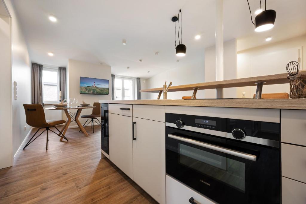 Kuchyň nebo kuchyňský kout v ubytování My Suite Leesch - Hotel & Restaurant nahe Büsum - Hunde herzlich willkommen
