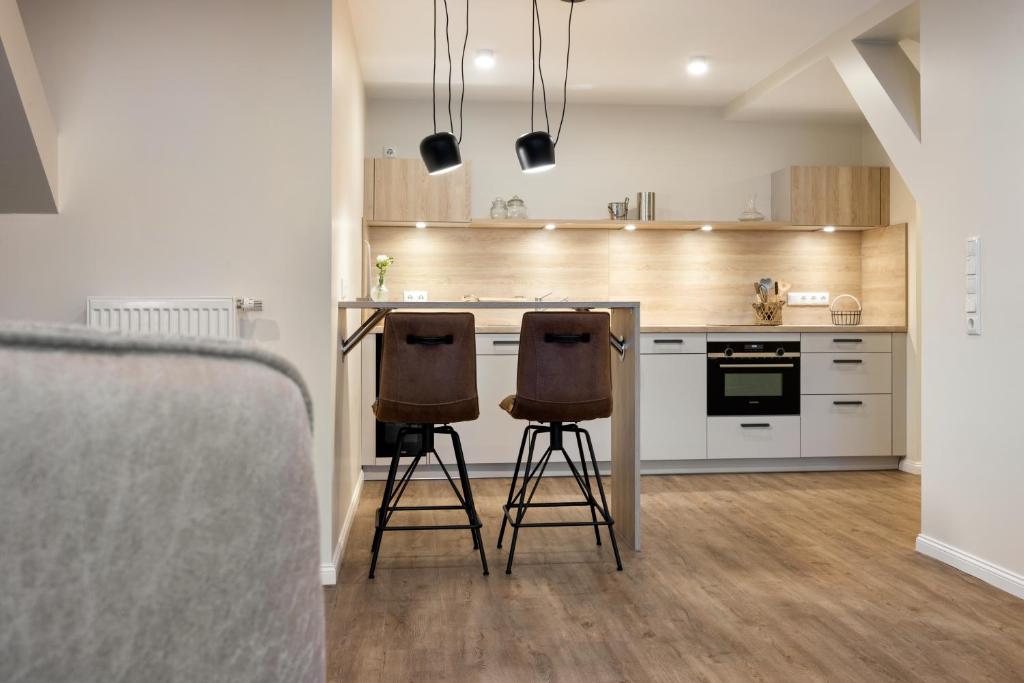 Kuchyň nebo kuchyňský kout v ubytování My Suite Leesch - Hotel & Restaurant nahe Büsum - Hunde herzlich willkommen