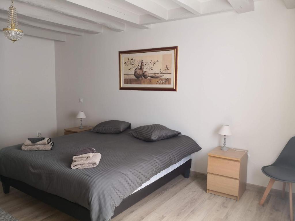 Posteľ alebo postele v izbe v ubytovaní La Longère de Thoré