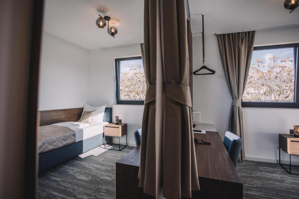 Rúm í herbergi á Hotel Batuda