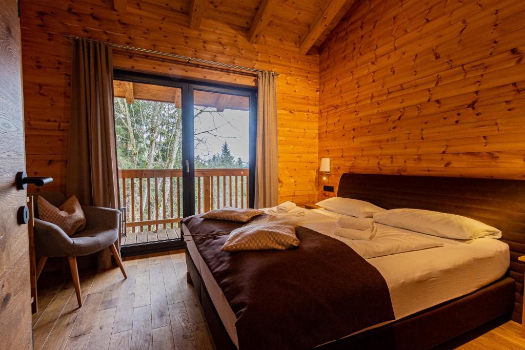 A bed or beds in a room at Chalet Dinkel in Niedernsill