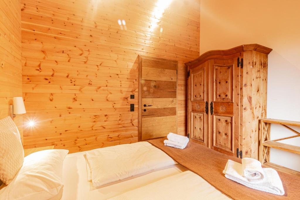 A bed or beds in a room at Chalet Dinkel in Niedernsill