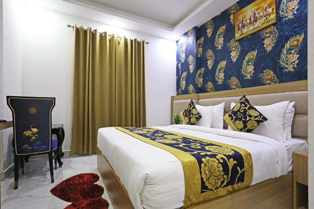 Postel nebo postele na pokoji v ubytování Hotel Decent Suites - Delhi Airport