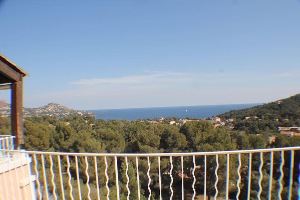 a view of the ocean from a balcony at appartement pour 6 personnes cap esterel in Saint-Raphaël