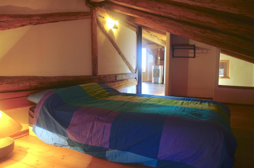 Postel nebo postele na pokoji v ubytování La Casa Altrui - Loft incantevole, open space