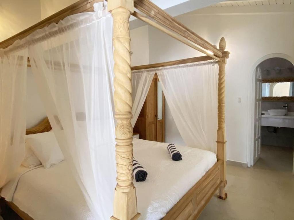 Postel nebo postele na pokoji v ubytování Beach Walk Residences
