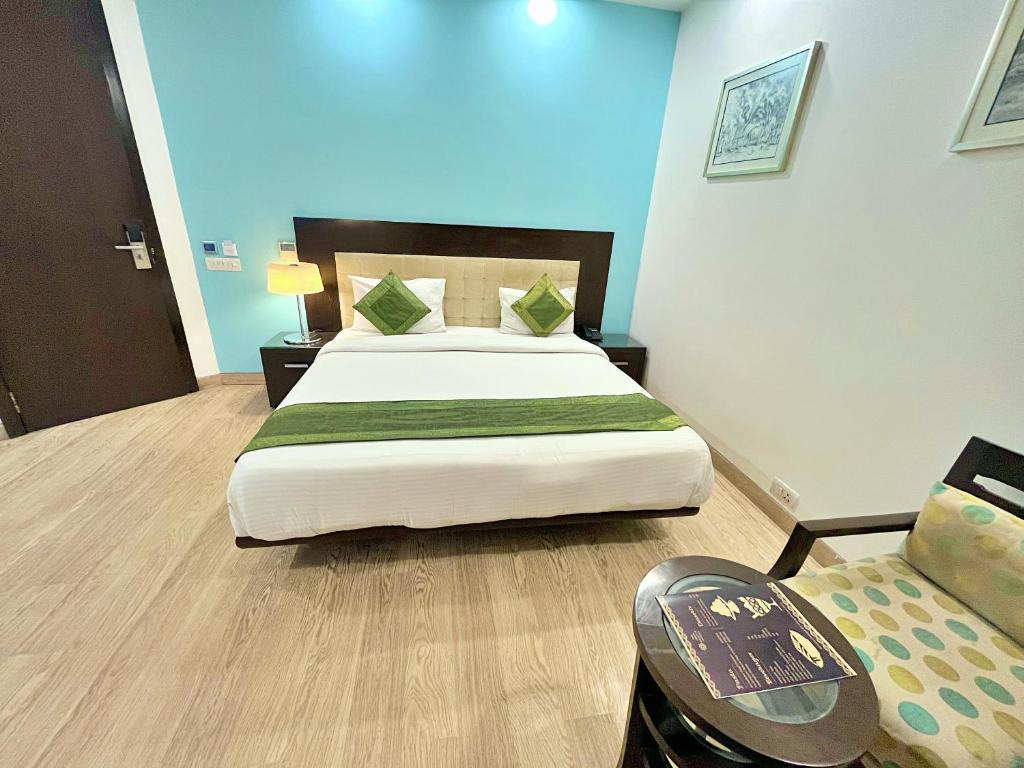 Postel nebo postele na pokoji v ubytování Amber Inn by Orion Hotels