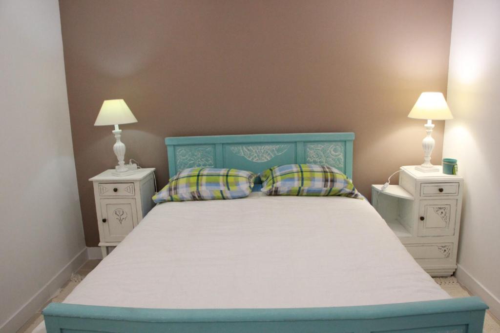 Uma cama ou camas num quarto em Quartos em vivenda serra da Estrela