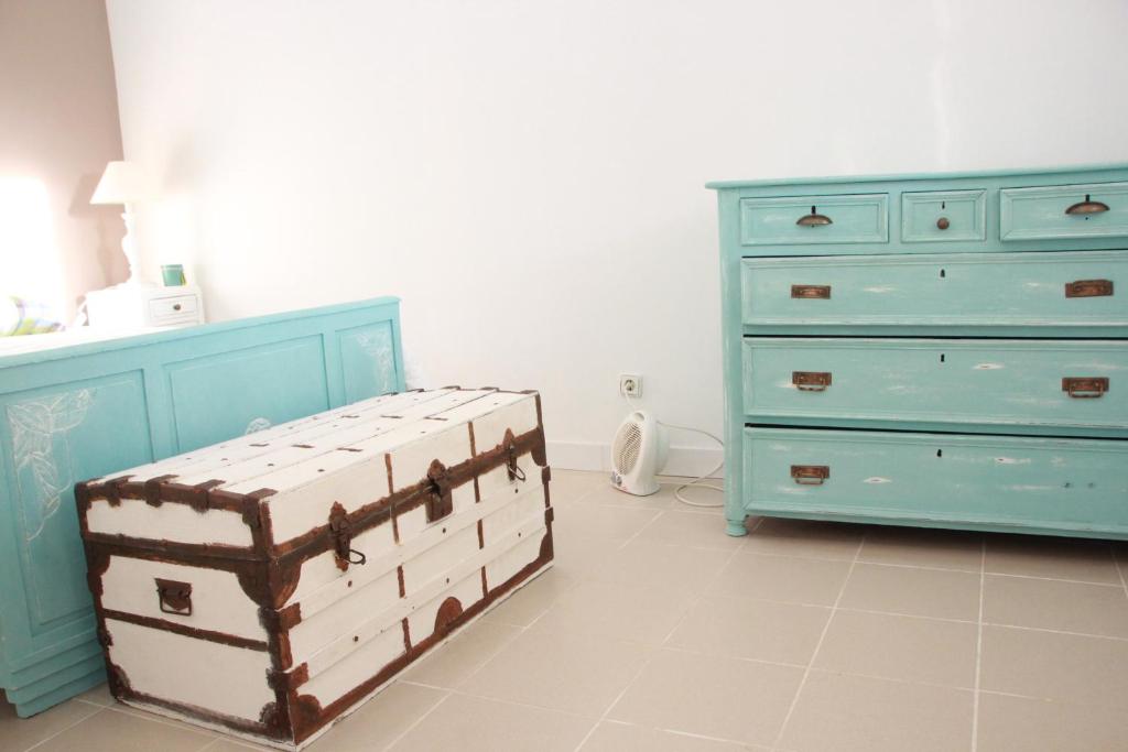 Uma cama ou camas num quarto em Quartos em vivenda serra da Estrela