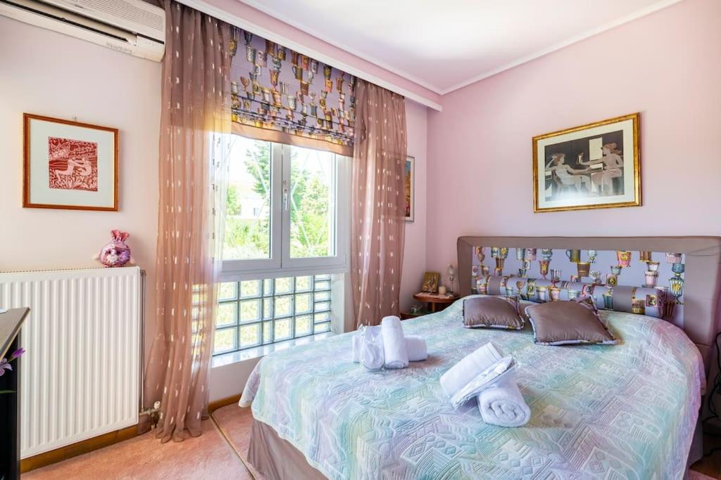 Postel nebo postele na pokoji v ubytování Villa serenity