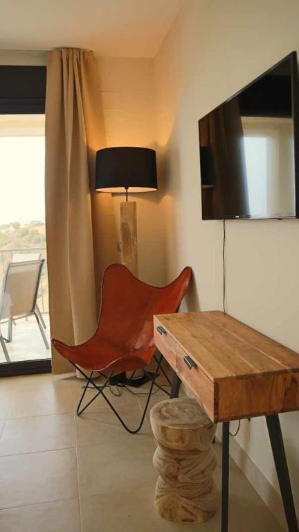 Televízia a/alebo spoločenská miestnosť v ubytovaní Marbella Resort Samara By Houselogy