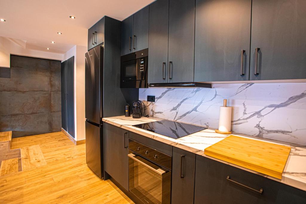Kuchyňa alebo kuchynka v ubytovaní APARTAMENTO BLOSSOM