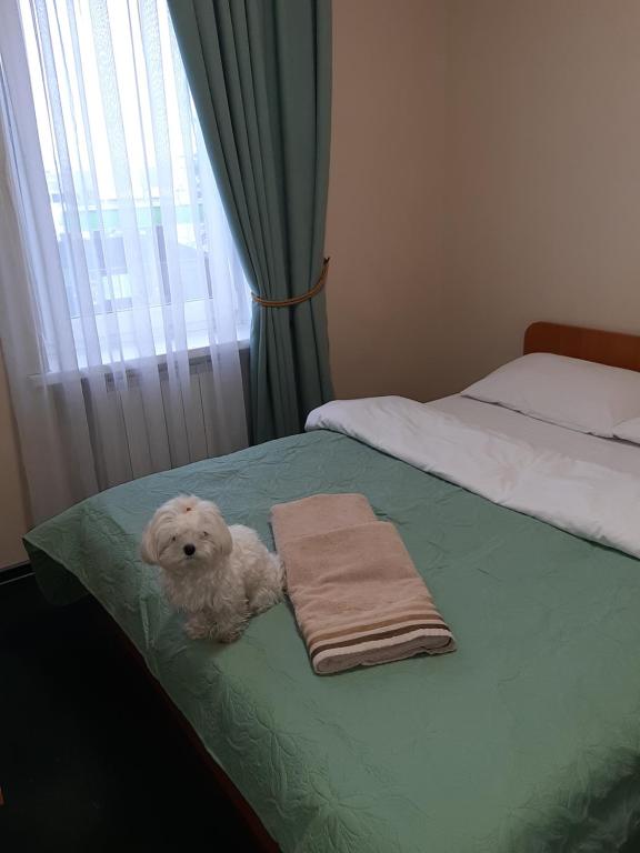 Postel nebo postele na pokoji v ubytování Готель "Опалковий Замок"