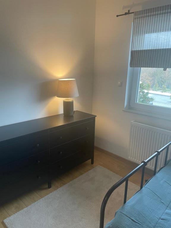 Postel nebo postele na pokoji v ubytování Apartament Kuba na Spokojnej