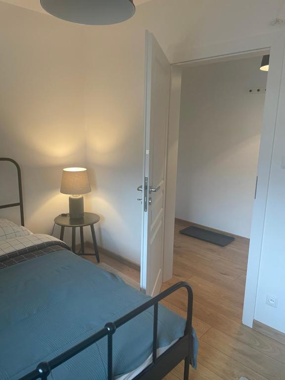 Postel nebo postele na pokoji v ubytování Apartament Kuba na Spokojnej