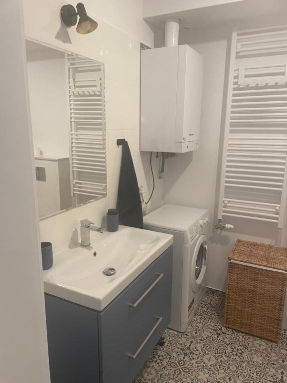 Kuchyň nebo kuchyňský kout v ubytování Apartament Kuba na Spokojnej