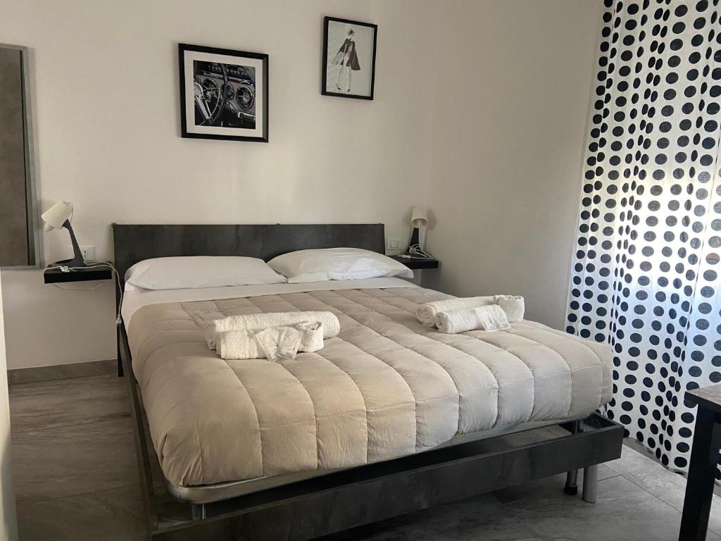 Postel nebo postele na pokoji v ubytování B&B FRONTEMARE San Salvo Marina CH