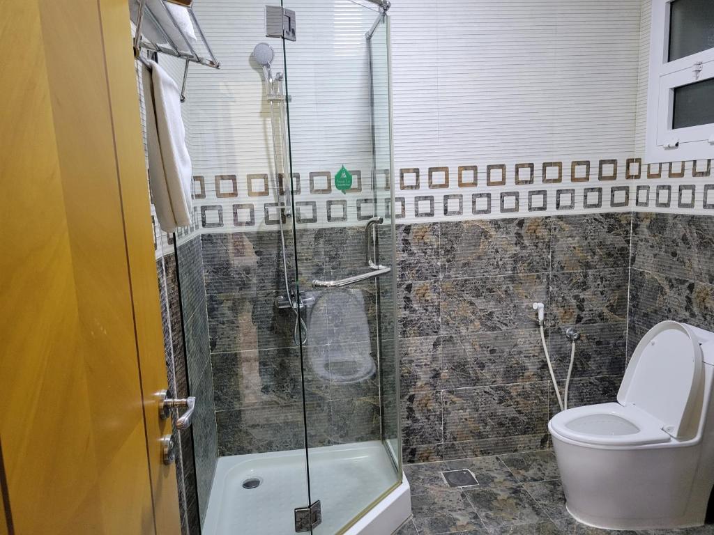 Koupelna v ubytování Farah Hotel Apartment