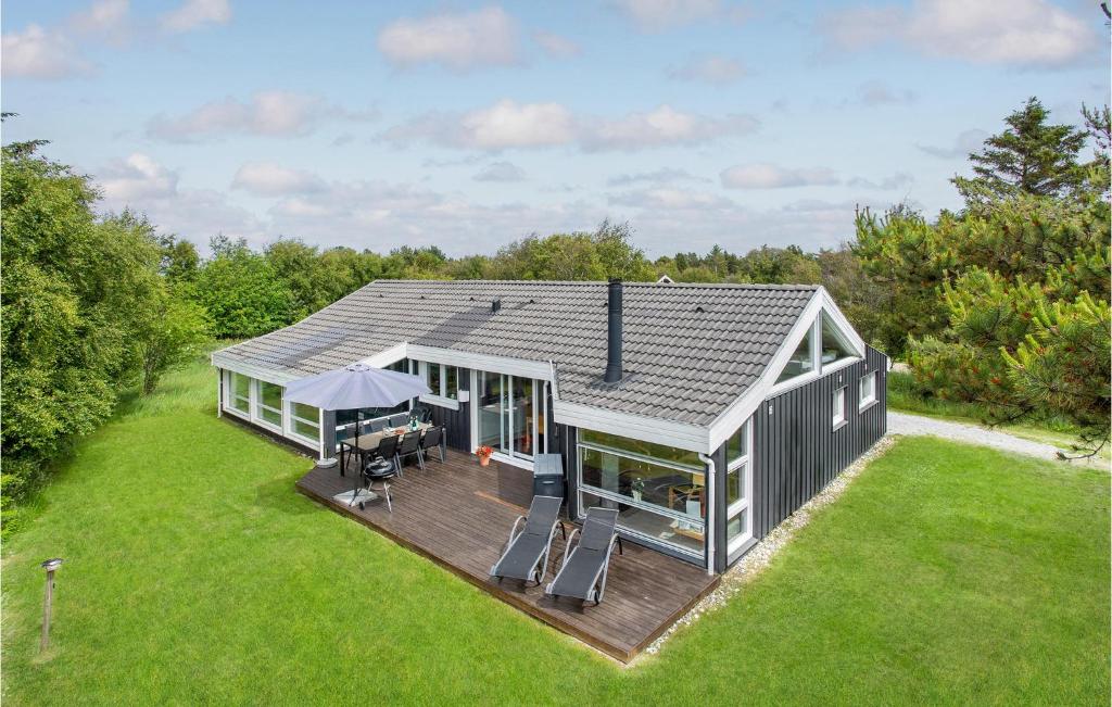 an overhead view of a house with a deck at Beautiful Home In Bindslev With 4 Bedrooms, Wifi And Indoor Swimming Pool in Bindslev