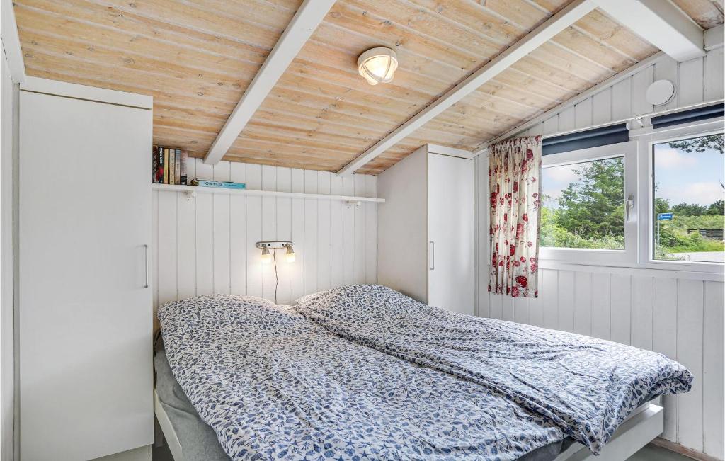 Postel nebo postele na pokoji v ubytování Holiday Home Rævevej Bindslev