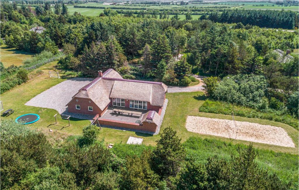 an aerial view of a large house with a yard at Awesome Home In Ulfborg With Outdoor Swimming Pool in Ulfborg
