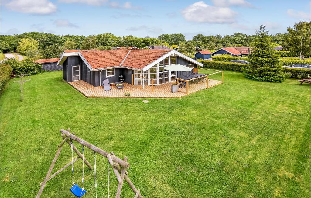 an aerial view of a house with a large yard at Holiday Home Sydals With Fireplace 1 in Sarup