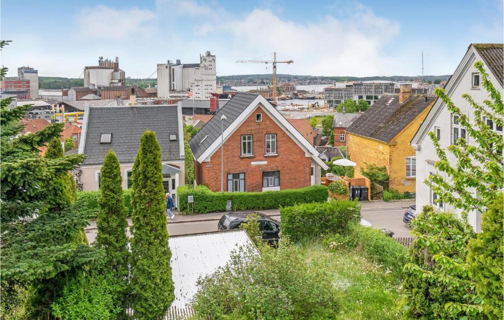 an aerial view of a city with houses at Beautiful Apartment In Svendborg With House Sea View in Svendborg