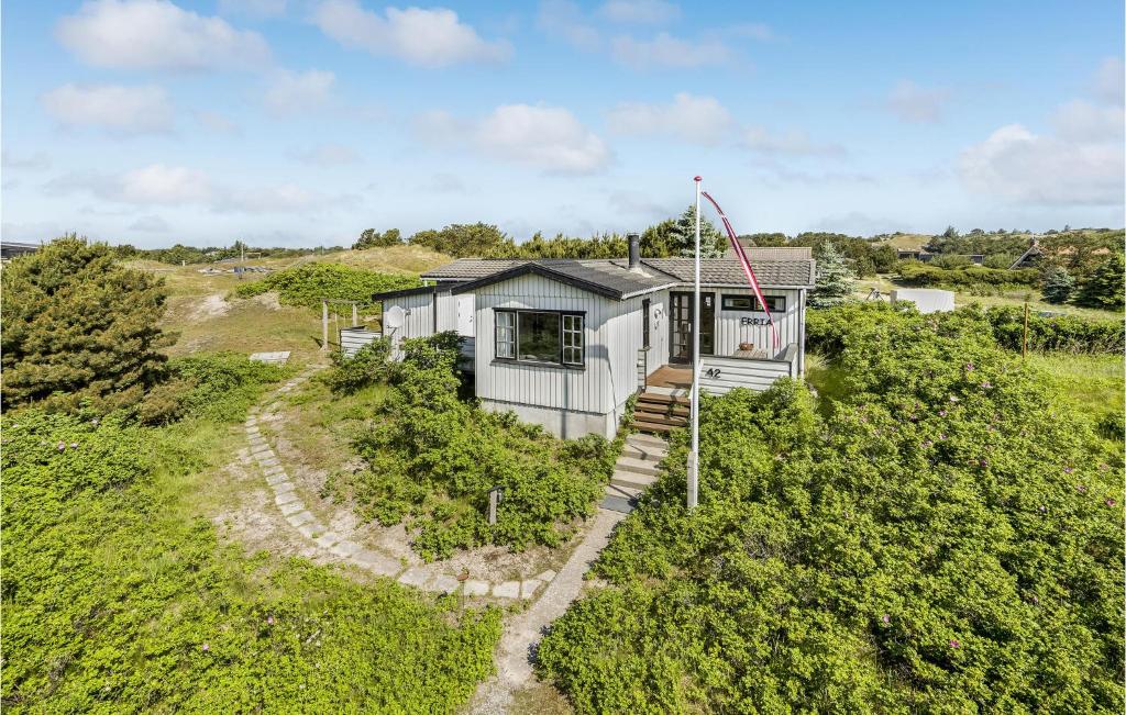 an aerial view of a tiny house on a hill at Stunning Home In Fan With Wifi in Fanø