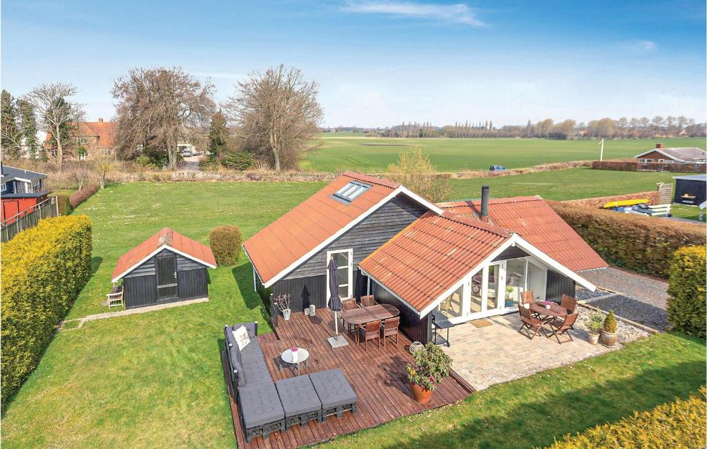 an aerial view of a house with a deck at 2 Bedroom Stunning Home In Karrebksminde in Karrebæksminde