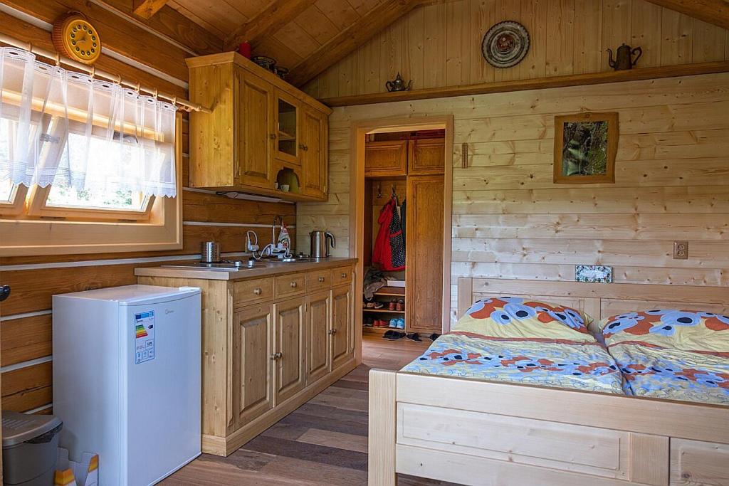 Kuchyň nebo kuchyňský kout v ubytování Miniresort AMULET