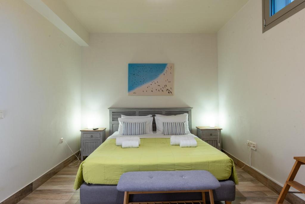 Posteľ alebo postele v izbe v ubytovaní Aelia Home Suites