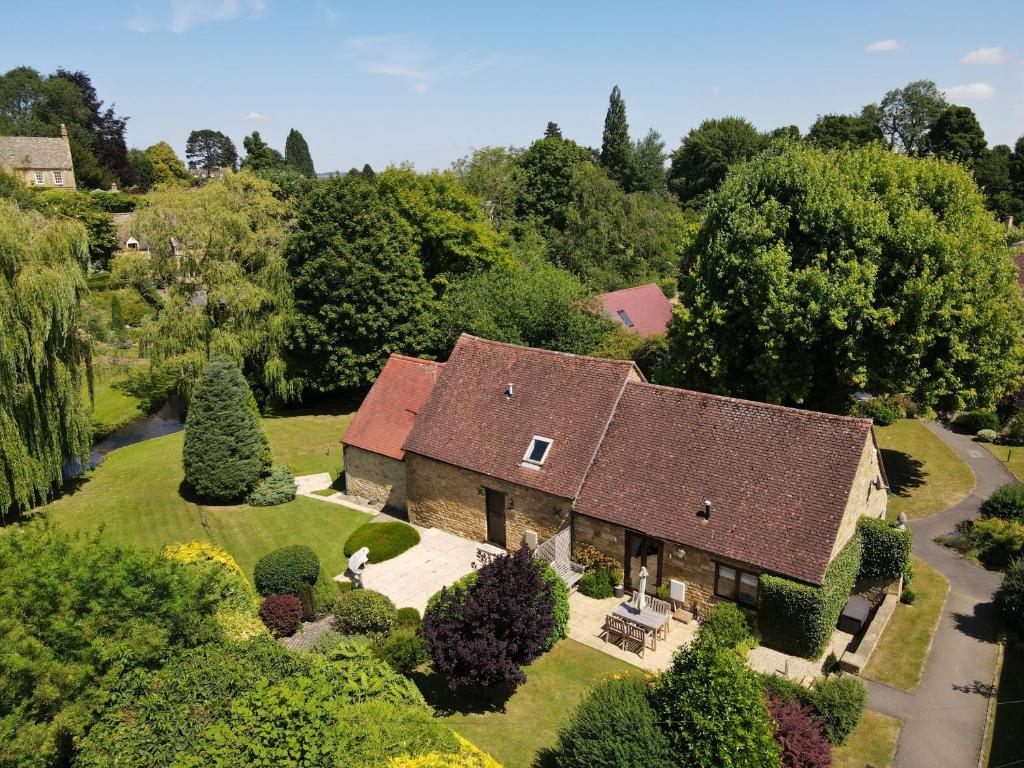 an aerial view of a house with a roof at Otters Abode in Blockley