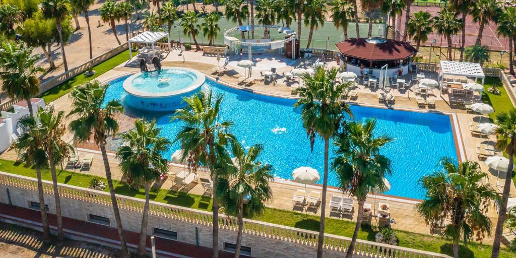 an overhead view of a swimming pool at a resort at Village Baia Turchese in Vieste