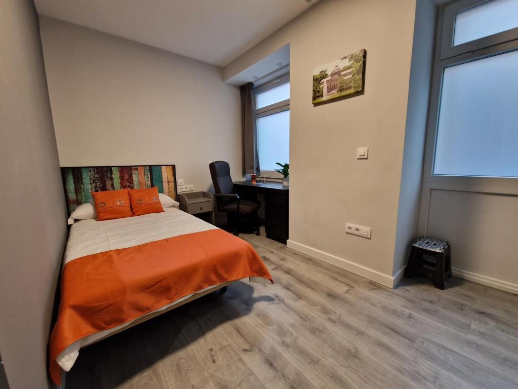 Posteľ alebo postele v izbe v ubytovaní Malasaña Dreams S,L