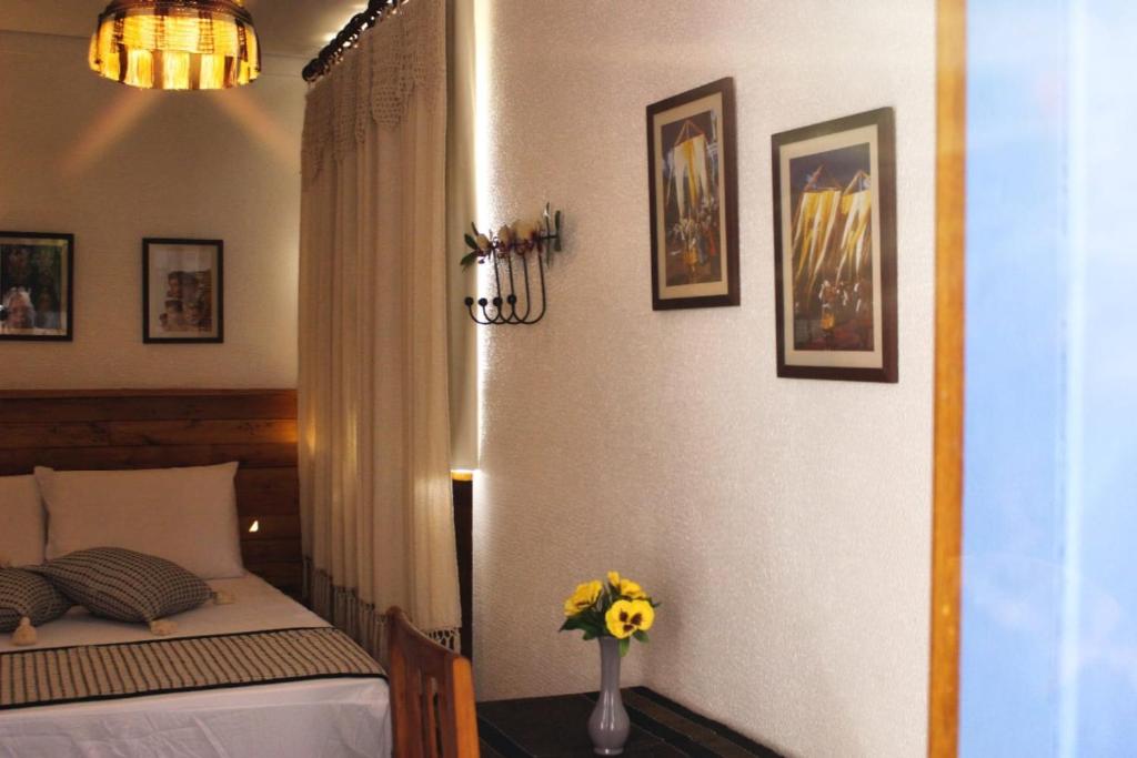 Photo de la galerie de l'établissement Pousada Caminhos de Minas Belo Horizonte, à Belo Horizonte