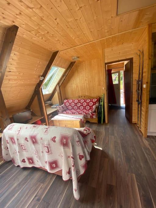 Postel nebo postele na pokoji v ubytování Chalet cosy, belle vue, dans le massif du Vercors