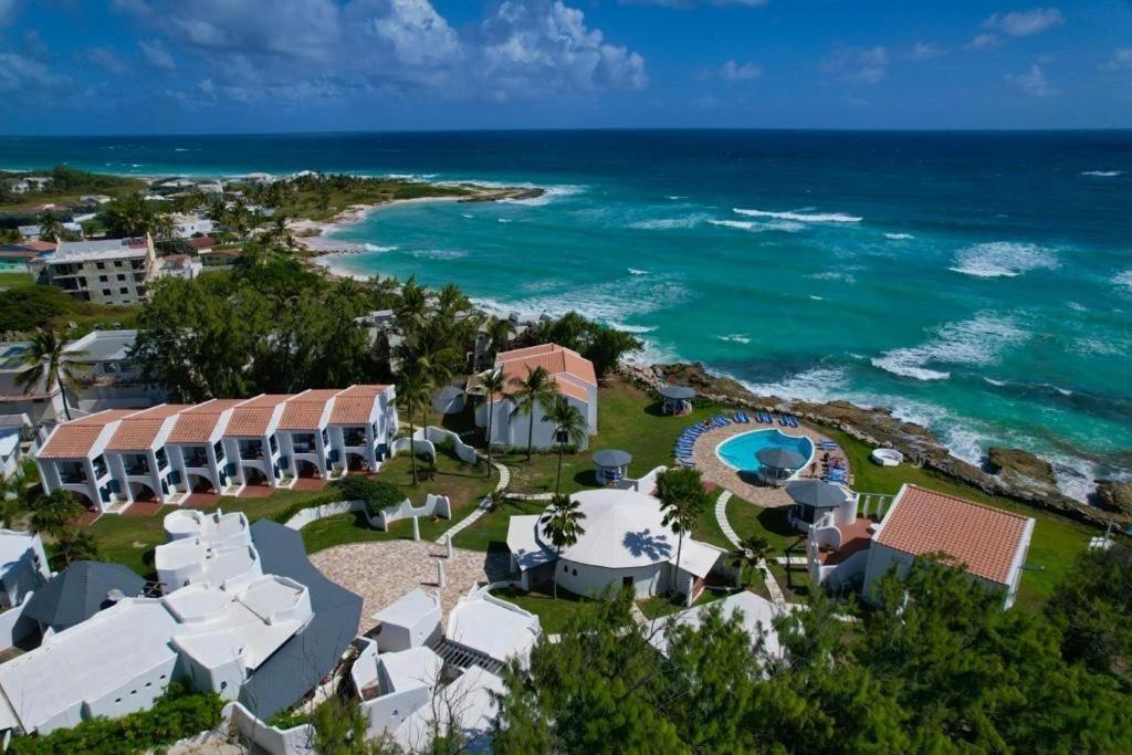 an aerial view of the resort and the ocean at OceanBlue Resort in Christ Church