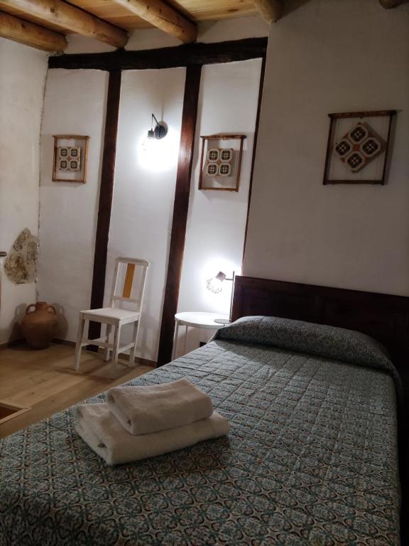 Postel nebo postele na pokoji v ubytování El Castellá